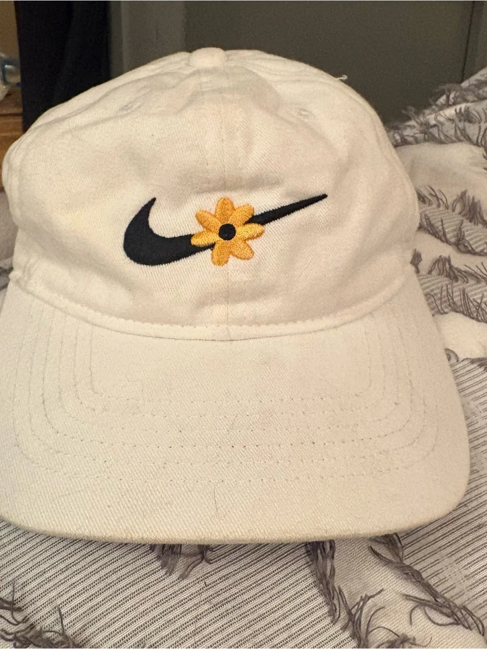 Nike Kids White Hat with Black Swoosh and Yellow Flower